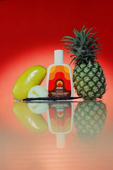 Gelato Messina–scented SPF 50 sunscreen bottle on reflective surface