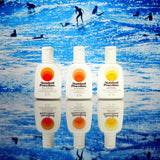Standard Procedure SPF 50+, SPF 30, and SPF 15 sunscreens lined up against a surf scene.