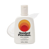 Sunscreen lotion SPF 50 pump bottle with a subtle lotion smear on a clean white background.