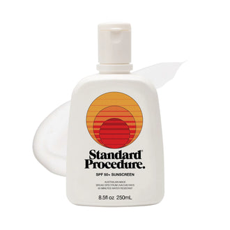 Sunscreen lotion SPF 50 pump bottle with a subtle lotion smear on a clean white background.