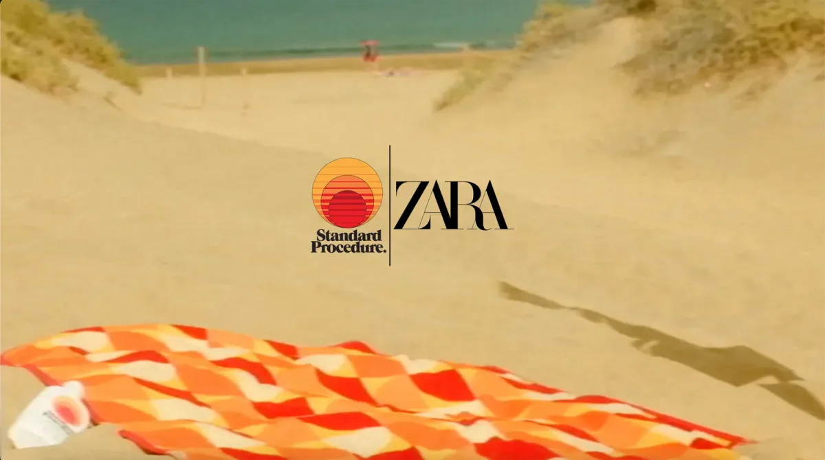 ZARA and Standard Procedure logos over a sunlit beach dune with a striped towel.