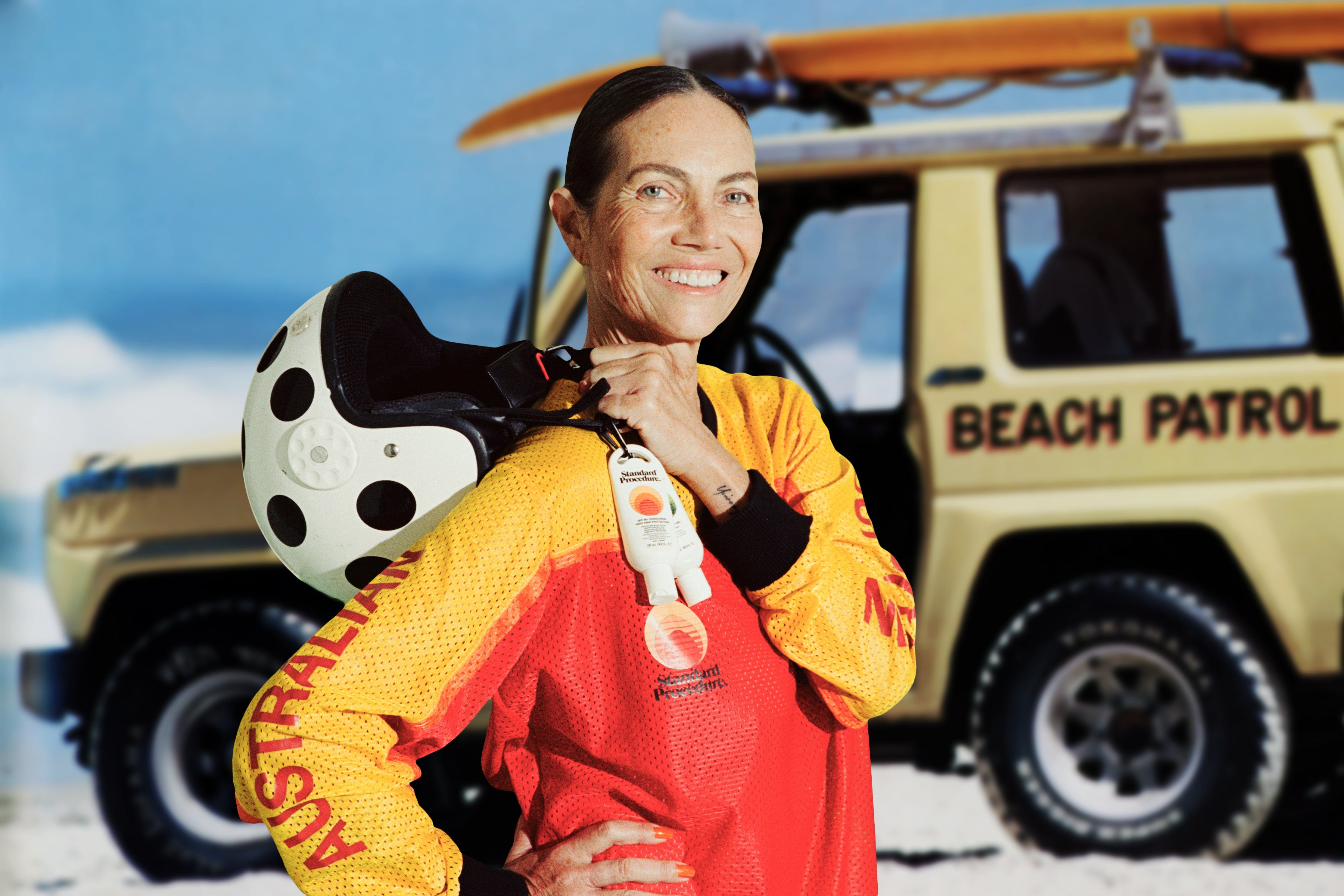 Australian lifesaver carrying Standard Procedure SPF 50+ travel sunscreen clipped to her patrol uniform.