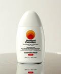 Standard Procedure Silk Mineral SPF 50 Sunscreen face lotion 50ml with Kakadu Plum extract on a reflective surface.