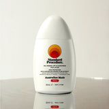 Standard Procedure Silk Mineral SPF 50 Sunscreen face lotion 50ml with Kakadu Plum extract on a reflective surface.