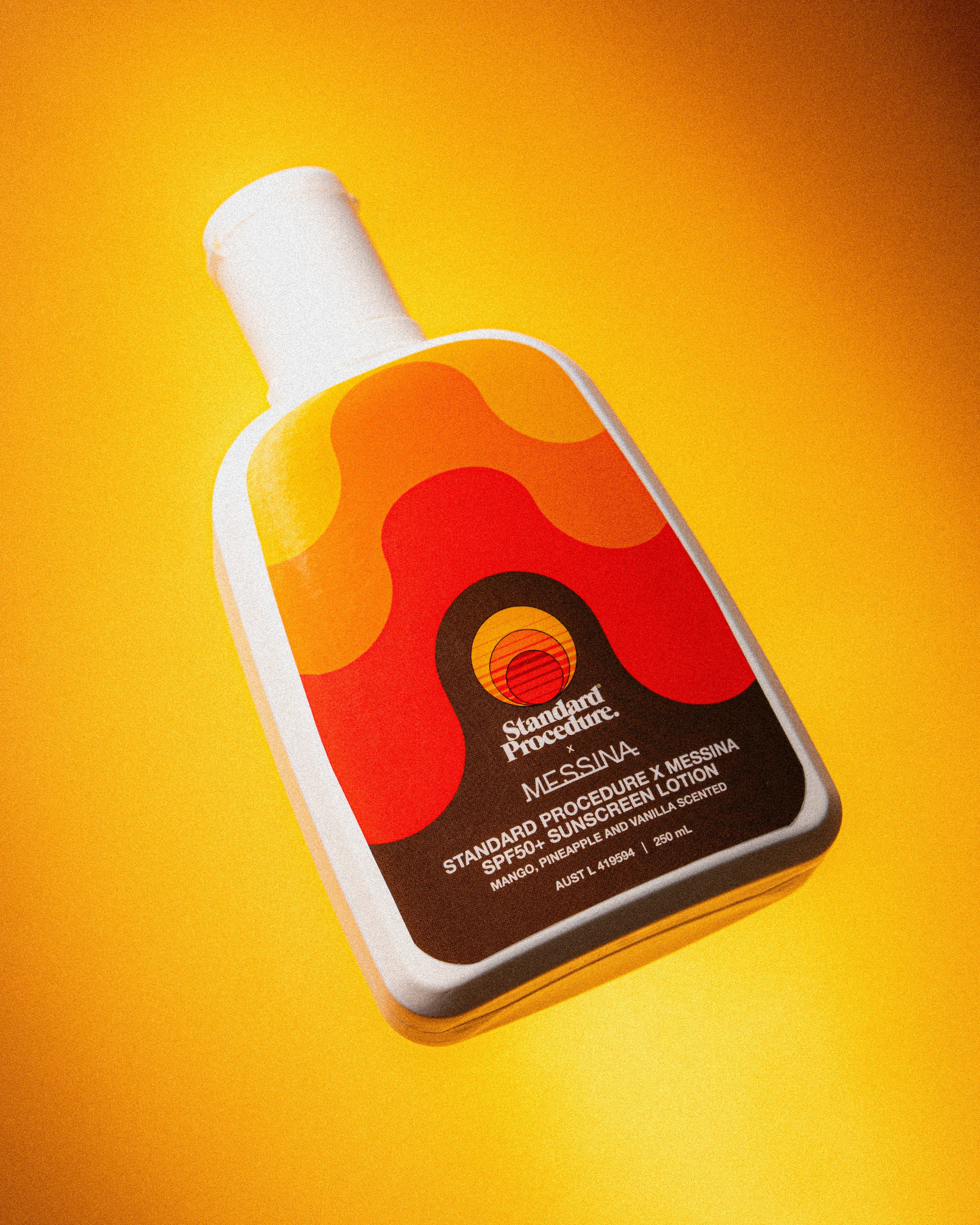 body sunscreen spf 50 bottle angled against a bright yellow background