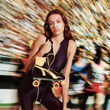 Zinc sunscreen stick under-eye stripes on a roller skater in a black suit holding a yellow-black skate against a blurred crowd background