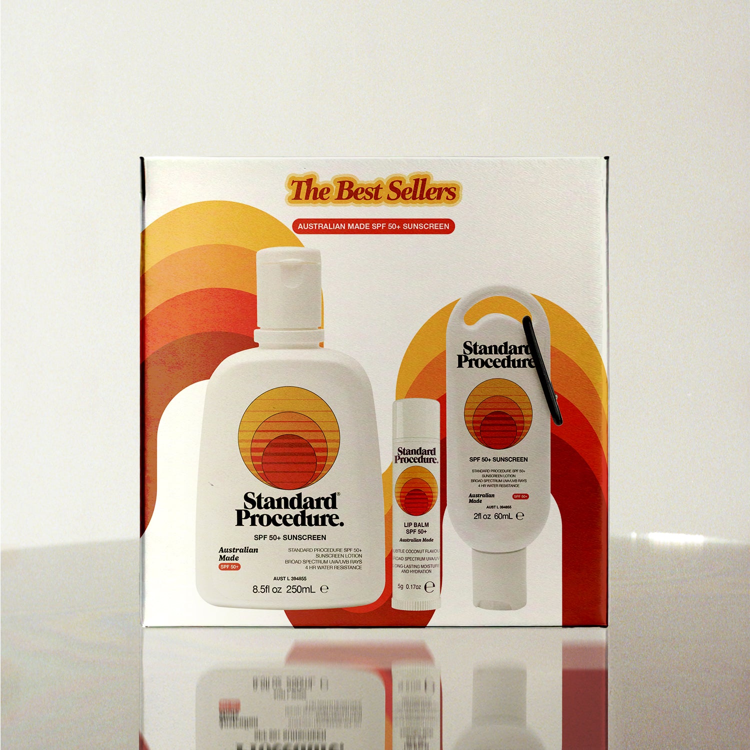 Standard Procedure Best Sellers Pack with SPF 50 Sunscreen 250ml, travel sunscreen 60ml, and Lip Balm in a gift box.