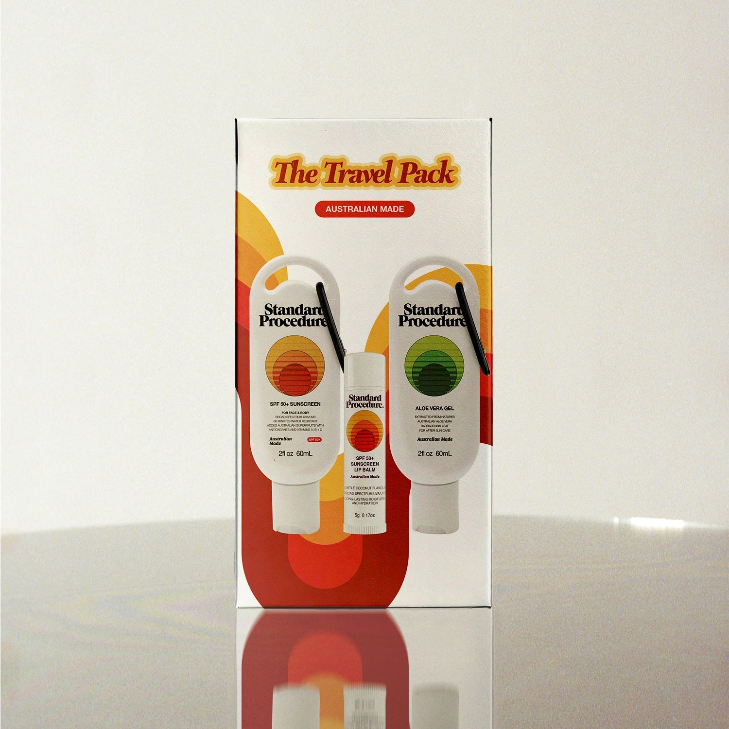 Standard Procedure Travel Pack with SPF 50 Sunscreen and Aloe Vera Gel travel tubes in a retro gift box.