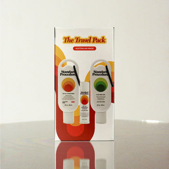 Standard Procedure Travel Pack with SPF 50 Sunscreen and Aloe Vera Gel travel tubes in a retro gift box.