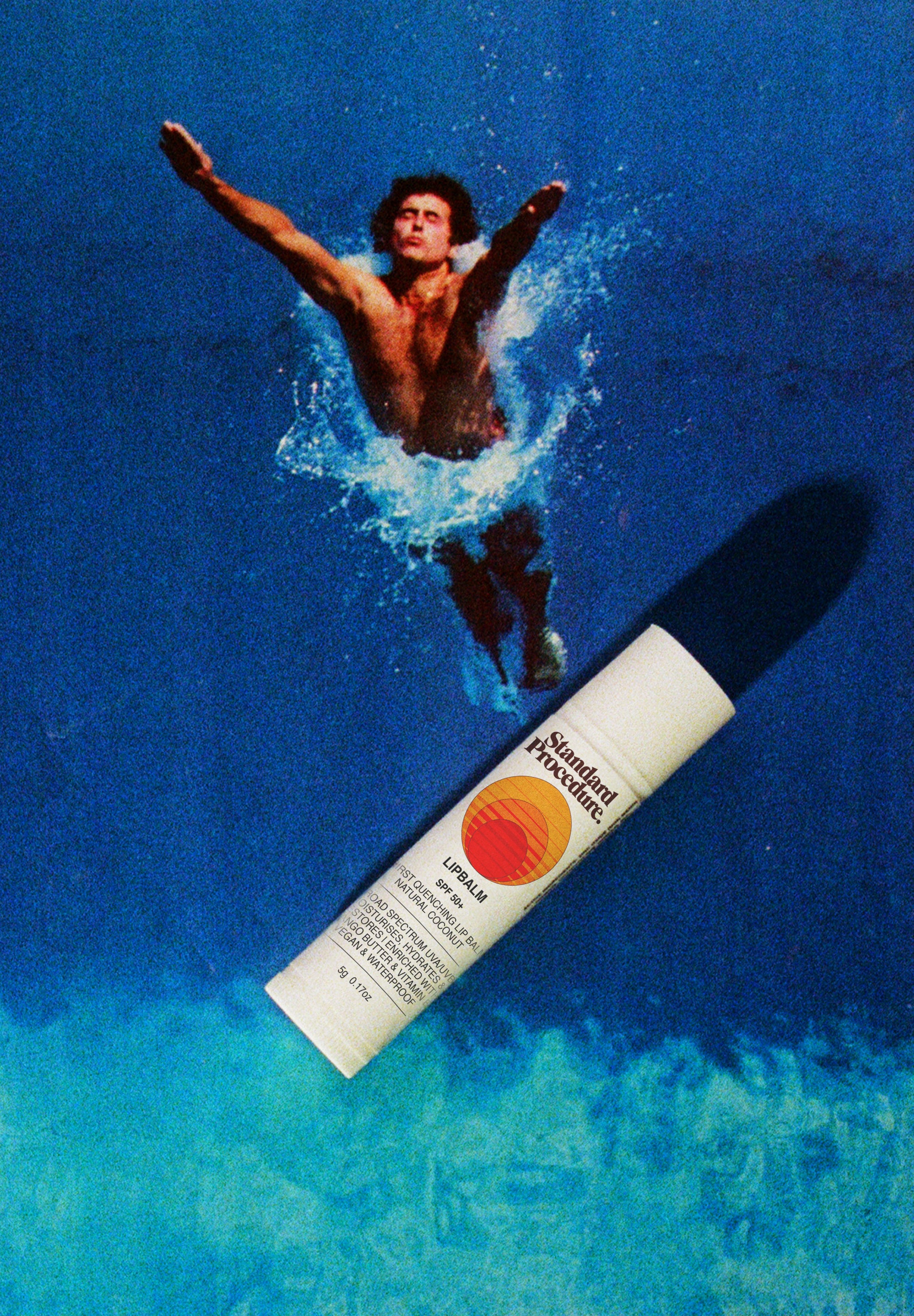 Vitamin C lip balm with SPF shown on a blue background next to a man diving into water.